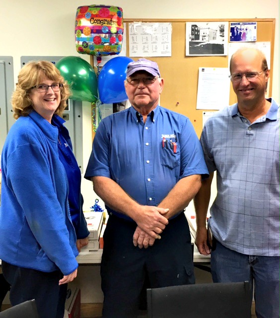 On July 29, 2016, John Betlem Heating & Cooling surprised retiring employee Wes Phillips with a retirement party. Pictured at the party are (L to R) Kathy Betlem, VP/General Manager of John Betlem, Wes Phillips, and Steve Stanton, previous owner of Lang Heating.